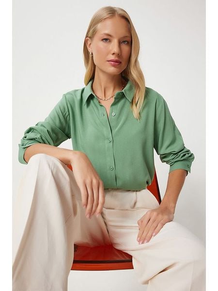 Happiness Istanbul Bluzka w kolorze jasnozielonym rozmiar: 38. Zielone bluzki Happiness Istanbul, bez wzorów, bez kołnierzyka, bez ramiączek. Za 70.24 zł.
