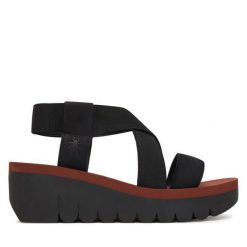 Sandały Fly London. Czarne sandały Fly London, bez wzorów, bez obcasa, na koturnie, bez zapięcia. Za 463.99 zł.