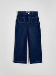 Jeansy culotte z wysokim stanem - granatowy. Niebieskie jeansy Reserved, bez wzorów, z podwyższonym stanem. W wyprzedaży za 69.99 zł.