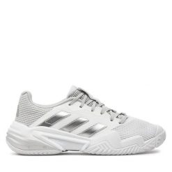 Buty do tenisa adidas. Białe obuwie sportowe Adidas, bez zapięcia, tenisowe. Za 409.99 zł.