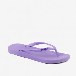 Damskie klapki Coqui. Fioletowe klapki Coqui, bez wzorów, z materiału, bez obcasa. Za 130.99 zł.