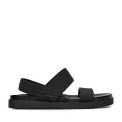 Sandały JENNY. Czarne sandały Jenny, bez wzorów, bez obcasa, na płaskiej podeszwie, bez zapięcia. Za 89.99 zł.