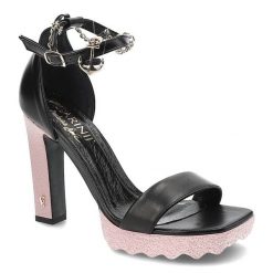 Czarne Sandały Carinii Eleganckie Skórzane Buty. Czarne sandały Carinii, bez wzorów, eleganckie, bez obcasa, na obcasie, bez zapięcia. Za 295.00 zł.