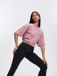 Jeansy flare z krótszą nogawką - czarny. Czarne jeansy Reserved, bez wzorów. Za 129.99 zł.
