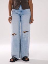 Jeansy wide leg z wysokim stanem i przetarciami - niebieski. Niebieskie jeansy Sinsay, l, bez wzorów, z podwyższonym stanem. Za 69.99 zł.