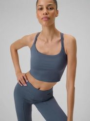 4F Top w kolorze niebieskim do jogi rozmiar: M. Niebieskie koszulki sportowe 4f, bez wzorów, z materiału, bez ramiączek, na jogę i pilates. Za 88.43 zł.