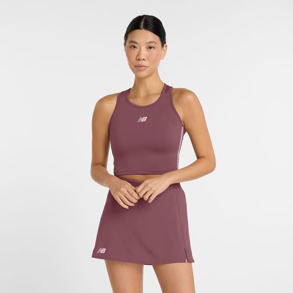 Koszulka damska New Balance WT51156FDP – bordowa. Czerwone koszulki sportowe New Balance, z aplikacjami, z materiału, bez ramiączek, do biegania. Za 89.99 zł.