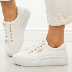 Białe trampki damskie Lee Cooper 4474. Białe trampki Lee Cooper, bez wzorów, z gumy, bez zapięcia. Za 139.00 zł.