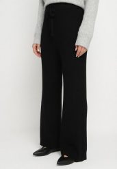 Czarne Szerokie Spodnie High Waist z Wiskozą z Gumką w Pasie Essica. Czarne spodnie materiałowe Born2be, na co dzień, l, z aplikacjami, z jeansu, z podwyższonym stanem. Za 99.99 zł.