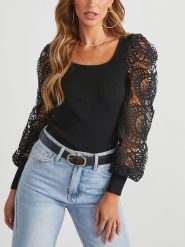 Milan Kiss Bluzka w kolorze czarnym rozmiar: S. Czarne bluzki Milan Kiss, s, bez wzorów, z koronki, bez kołnierzyka, bez ramiączek. Za 161.34 zł.