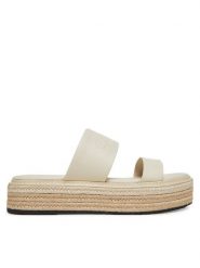 Calvin Klein Klapki Flatform Wedge Slide - He HW0HW02374 Kremowy. Białe klapki Calvin Klein, bez wzorów, ze skóry, bez obcasa. Za 299.99 zł.
