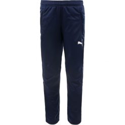 Spodnie Sportowe PUMA JR Peacoat 116 - Optymalny Komfort i Swoboda Ruchu. Niebieskie spodnie dresowe Puma, bez wzorów, z poliesteru, do piłki nożnej. Za 125.99 zł.