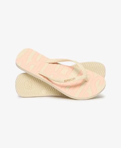 Superdry Klapki Core Logo z gumy – RICE WHITE/CORAL. Białe klapki Superdry, bez wzorów, bez obcasa. Za 134.00 zł.