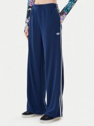 Adidas Spodnie dresowe adicolor Firebird JV7524 Granatowy Regular Fit. Niebieskie spodnie dresowe Adidas, xl, bez wzorów, z dresówki. Za 349.99 zł.