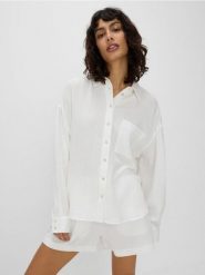 Koszula z bawełnianego muślinu - biały. Białe koszule Reserved, l, bez wzorów, z bawełny, bez kołnierzyka, bez ramiączek. W wyprzedaży za 99.99 zł.