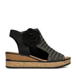 Sandały Rieker. Czarne sandały Rieker, bez wzorów, bez obcasa, na koturnie, bez zapięcia. Za 359.99 zł.