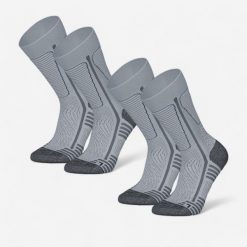 Skarpety turystyczne SH500 Mountain Mid. Niebieskie skarpety QUECHUA, bez wzorów, z elastanu. Za 99.99 zł.