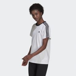 Koszulka fitness damska Adidas Essentials 3-Stripes Tee. Białe bluzki Adidas, xs, bez wzorów, sportowe, bez kołnierzyka, bez ramiączek. W wyprzedaży za 111.15 zł.