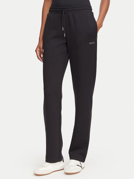 Guess Spodnie dresowe V6YB25 K4803 Czarny Regular Fit. Czarne spodnie dresowe Guess, s, z aplikacjami, z dresówki. Za 344.99 zł.