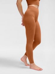 Damskie legginsy bezszwowe Hummel MT Adapt MW. Brązowe legginsy Hummel, xs, bez wzorów, z dzianiny, z podwyższonym stanem. Za 252.50 zł.
