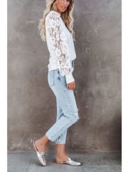 Milan Kiss Bluzka w kolorze białym rozmiar: S. Białe bluzki Milan Kiss, s, bez wzorów, z koronki, bez kołnierzyka, bez ramiączek. Za 134.85 zł.