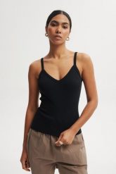 TOP CAMI CZARNY S - Flawless. Czarne topy Flawless, s, bez wzorów, z bawełny, bez kołnierzyka, bez ramiączek. Za 179.00 zł.