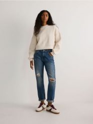 Jeansy boyfriend z przetarciami - granatowy. Niebieskie jeansy Reserved, bez wzorów. W wyprzedaży za 79.99 zł.