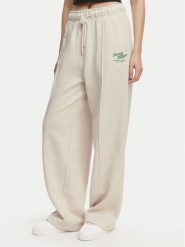 Tommy Hilfiger Spodnie dresowe Logo Exaggerated Seam WW0WW50783 Kremowy Relaxed Fit. Białe spodnie dresowe TOMMY HILFIGER, s, bez wzorów, z bawełny. Za 649.99 zł.