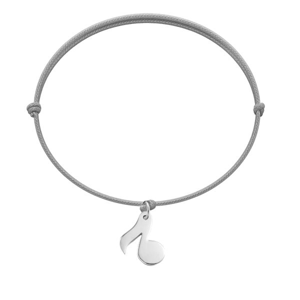 Bransoletka ze srebrną nutką na cienkim jasnoszarym sznurku. Szare bransoletki Lilou, srebrne. Za 139.00 zł.