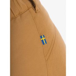 Spodnie outdoorowe damskie Fjallraven Stina Trousers. Brązowe spodnie sportowe Fjällräven, na lato, l, bez wzorów, trekkingowe. Za 682.95 zł.
