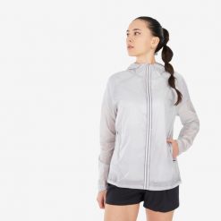 Kurtka turystyczna damska Quechua MH900 Light. Białe kurtki sportowe QUECHUA, l, bez wzorów, z materiału, bez kaptura, trekkingowe. W wyprzedaży za 89.99 zł.