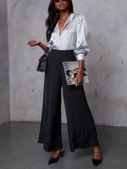 LA Angels Spodnie w kolorze czarnym rozmiar: S. Czarne spodnie materiałowe LA Angels, na co dzień, s, bez wzorów, z materiału, z podwyższonym stanem. Za 200.13 zł.