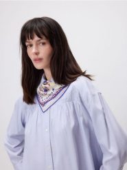 Koszula z marszczeniem - jasnoniebieski. Niebieskie koszule Reserved, l, bez wzorów, z bawełny, bez kołnierzyka, bez ramiączek. Za 179.99 zł.