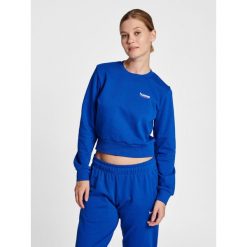Damska krótka bluza Hummel LGC Shai. Niebieskie bluzy sportowe Hummel, s, bez wzorów, z bawełny, bez kaptura. Za 236.50 zł.