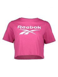 Reebok Koszulka w kolorze różowym rozmiar: M. Różowe bluzki Reebok, m, bez wzorów, bez kołnierzyka, bez ramiączek. Za 66.31 zł.