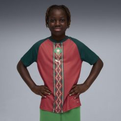 Młodzieżowa koszulka na rozgrzewkę Maroka PUMA. Czerwona bluzki Puma, m, bez wzorów, młodzieżowe, bez kołnierzyka, bez ramiączek. Za 327.50 zł.