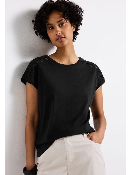 Street One Koszulka w kolorze czarnym rozmiar: 36. Czarne bluzki Street One, bez wzorów, z bawełny, street, bez kołnierzyka, bez ramiączek. Za 70.08 zł.