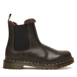 Sztyblety Dr. Martens. Czarne botki Dr. Martens, bez wzorów, bez obcasa, na płaskiej podeszwie, bez zapięcia. Za 989.99 zł.