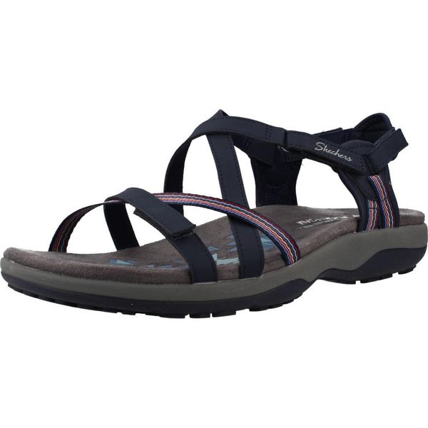 Sandały SKECHERS 163115S Niebieski. Niebieskie sandały Skechers, bez wzorów, z materiału, bez obcasa, bez zapięcia. Za 281.99 zł.