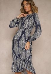 Niebieska Rozkloszowana Sukienka w Etniczny Print z Gumką w Talii i Falbanką Napirea. Niebieskie sukienki Renee, na co dzień, m, bez wzorów, eleganckie, bez kołnierzyka, bez ramiączek, midi, rozkloszowane. Za 79.99 zł.