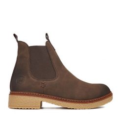 Botki Rieker. Brązowe botki Rieker, bez wzorów, bez obcasa, na płaskiej podeszwie, bez zapięcia. Za 349.99 zł.