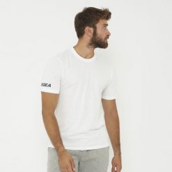 Biała koszulka ARIA z bawełny. Białe bluzki LEGEA, bez wzorów, z bawełny, sportowe, bez kołnierzyka, bez ramiączek. Za 52.00 zł.