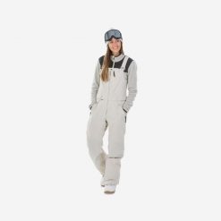 Second Life - Spodnie snowboardowe ogrodniczki damskie... - Stan Dobry. Brązowe spodnie narciarskie DREAMSCAPE, s, bez wzorów, z materiału, narciarskie. Za 399.00 zł.