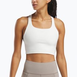 Koszulka Reebok Lux Tank. Białe bluzki REEBOK FITNESS, bez wzorów, sportowe, bez kołnierzyka, bez ramiączek. Za 209.99 zł.