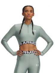 Under Armour Koszulka sportowa w kolorze turkusowym rozmiar: M. Niebieskie koszulki sportowe Under Armour, bez wzorów, z materiału, bez ramiączek, outdoorowe. Za 132.05 zł.