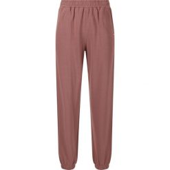 Damskie spodnie dresowe Athlecia Carmen. Brązowe spodnie dresowe Athlecia, bez wzorów, z dresówki. Za 180.00 zł.