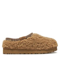 Kapcie Ugg. Brązowe obuwie domowe UGG, bez wzorów, bez zapięcia. Za 619.99 zł.