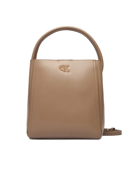 Calvin Klein Torebka Ck Bucket With Strap LV04F3174G Beżowy. Brązowe torebki klasyczne Calvin Klein, bez wzorów, ze skóry, bez dodatków. Za 569.99 zł.