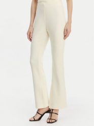 Calvin Klein Spodnie materiałowe LV044B223G Beżowy Flare Fit. Brązowe spodnie materiałowe Calvin Klein, xxl, bez wzorów, z materiału. Za 529.99 zł.