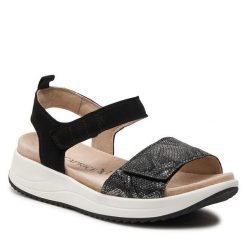 Sandały Caprice. Czarne sandały Caprice, bez wzorów, bez obcasa, na płaskiej podeszwie, bez zapięcia. Za 229.99 zł.